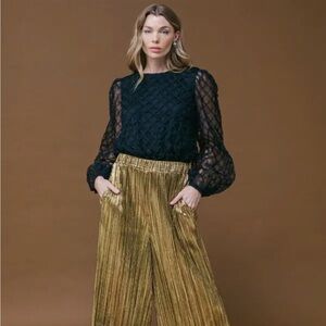 Textured black top long sleeves with elastic around wrists.  NWT